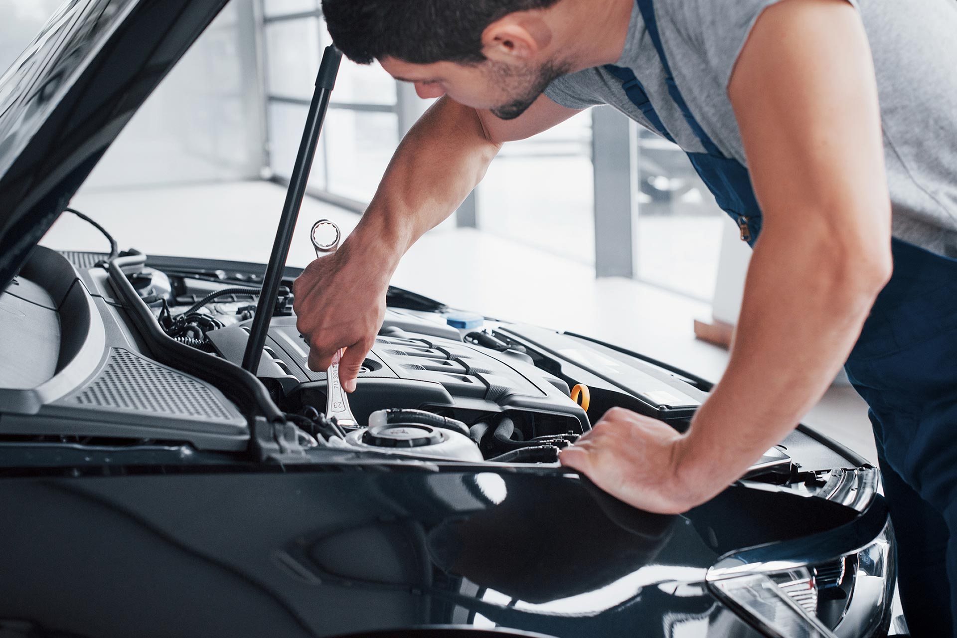 Mechanic working on car